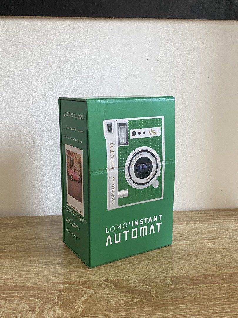 Lomo'Instant Automat Green Polka Dot Camera (Category: Cameras) located in Manila. Submitted by matchatanuki (Listing ID 1448302365, Image 1). Description: Lomo’instant Automat Lomography Camera - Wallet-sized instant Photos - Uses Fujifilm Instax Mini Film - Boxed and used twice only - Has warranty (only valid is Japan) - Built in 60mm lens (35mm equivalent) - Bought from Europe - Runs on two CR2 batteries (already in the cam) Inclusions: - Remo