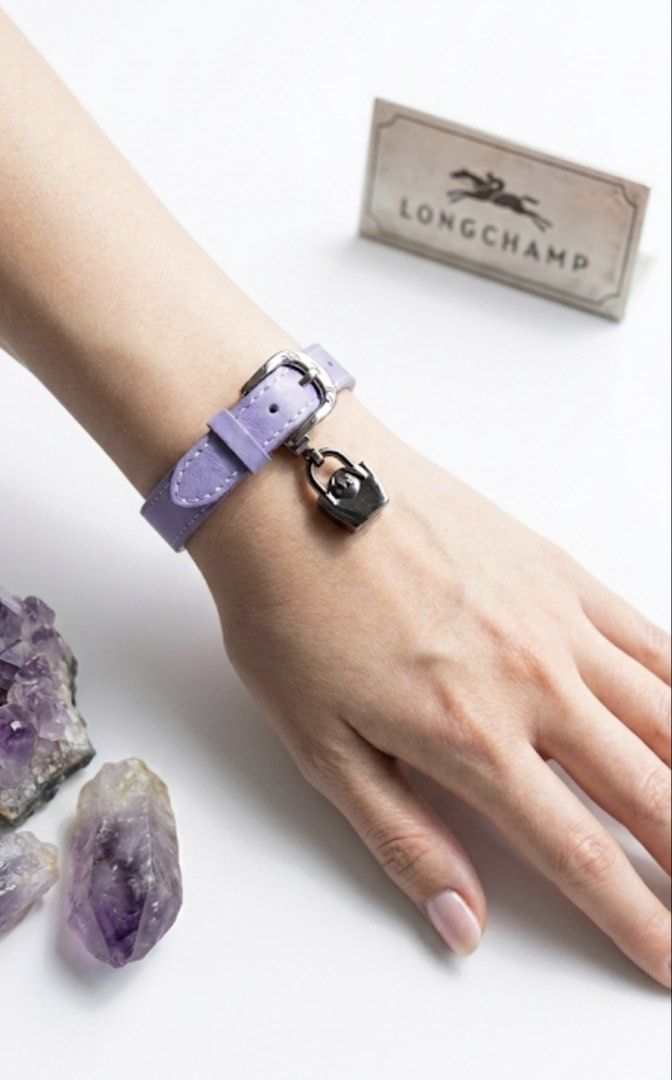 LONGCHAMP LE PLIAGE LEATHER BRACELET, PURPLE (Category: Bracelets) located in Quezon City. Submitted by carsenmktg (Listing ID 1437010787, Image 1). Description: LONGCHAMP LE PLIAGE LEATHER BRACELET, PURPLE guaranteed authentic. lightly used in very good condition.Has some minor scratches on the hardware. bought in italy for about Php11,000. Description: Original Longchamp Le Pliage Héritage bracelet made of genuine leather. The model has a thin 