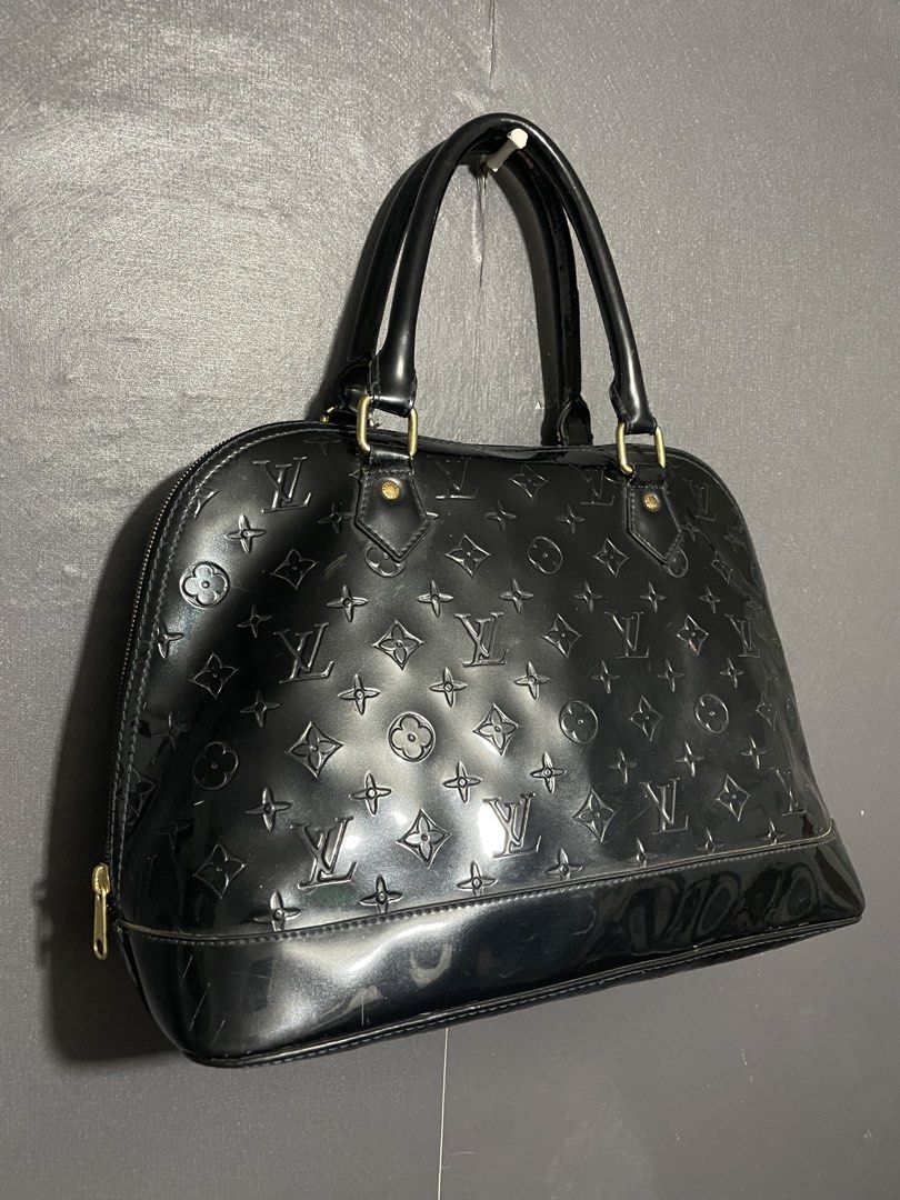 Louis Vuitton 2011 Monogram Vernis Alma GM Handbag (Category: Luxury Bags & Wallets) located in Manila. Submitted by claii_collection (Listing ID 1448371221, Image 1). Description: Louis Vuitton 2011 Monogram Vernis Alma GM Handbag - Large Size Bag (Can fit a Ipad Air) - Excellent Condition (Repaired) - Complete Side Engraved Tags and Inside Tags - Japan Surplus Finds .