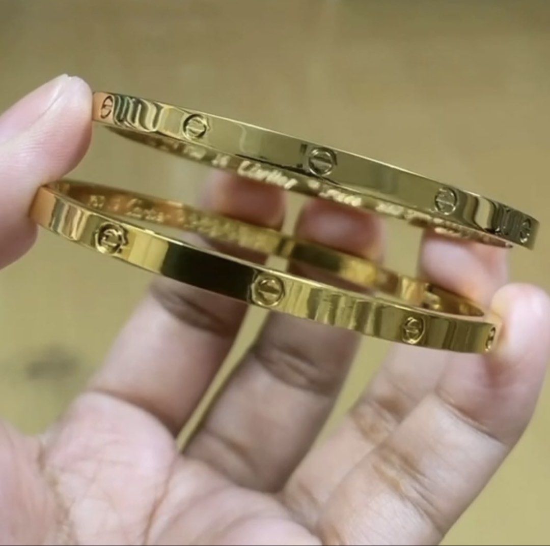 Love Bangle (Category: Jewelry) located in Pasig City. Submitted by evrylabel (Listing ID 1448423508, Image 2). Description: Stainless but looks like 18k gold. Really nice quality! 14-15cm.