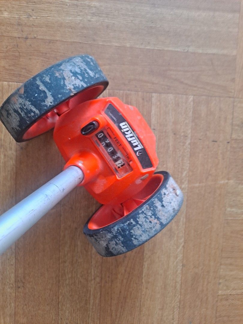 Lufkin Measuring Wheel (Category: Medical Supplies & Tools) located in Manila. Submitted by luckyturtle_0ef0cb (Listing ID 1448278816, Image 2). Description: - Orange and silver - Black handle - Ideal for measuring distances.