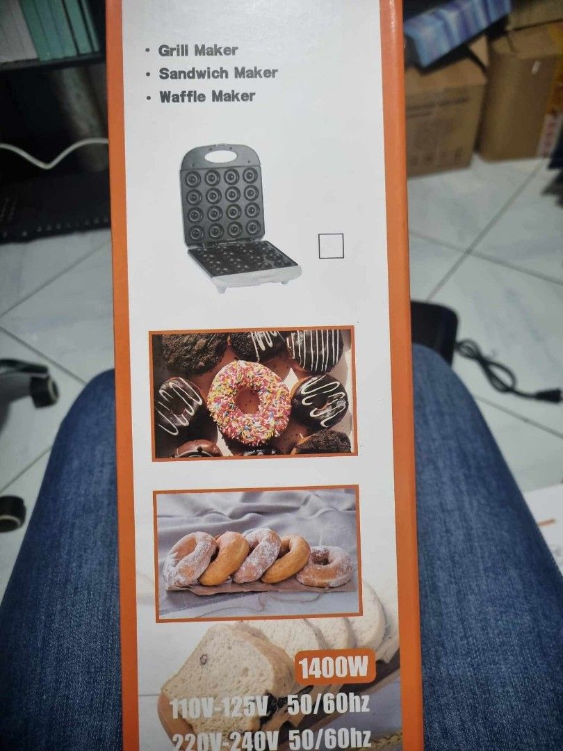MAX 1400W Donut Maker Grill Sandwich Waffle Maker (Category: Other Kitchen Appliances) located in Manila. Submitted by mightycloud_1992 (Listing ID 1448294474, Image 3). Description: - 1400W Mini Donut Maker for home baking - Makes 24 mini donuts at a time - Versatile: also functions as a grill, sandwich, and waffle maker - Comes with an instruction manual - Ideal for creating homemade treats.