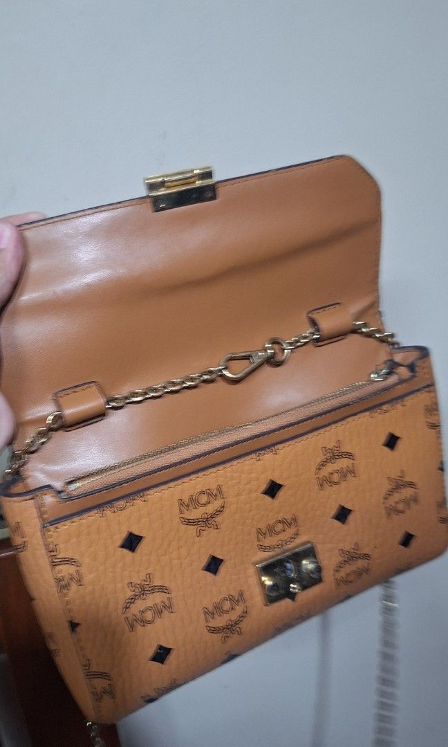 MCM sling bag (Category: Luxury Bags & Wallets) located in Quezon City. Submitted by little.tinderella (Listing ID 1448359028, Image 3). Description: MCM sling bag, good condition pa po ang leather, may signs of use sa kanyang hardwares. NGA, please self authenticate po..