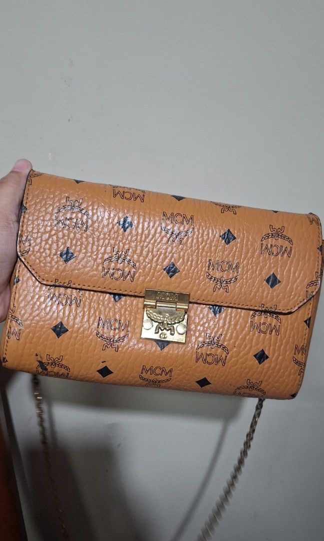 MCM sling bag (Category: Luxury Bags & Wallets) located in Quezon City. Submitted by little.tinderella (Listing ID 1448359028, Image 1). Description: MCM sling bag, good condition pa po ang leather, may signs of use sa kanyang hardwares. NGA, please self authenticate po..