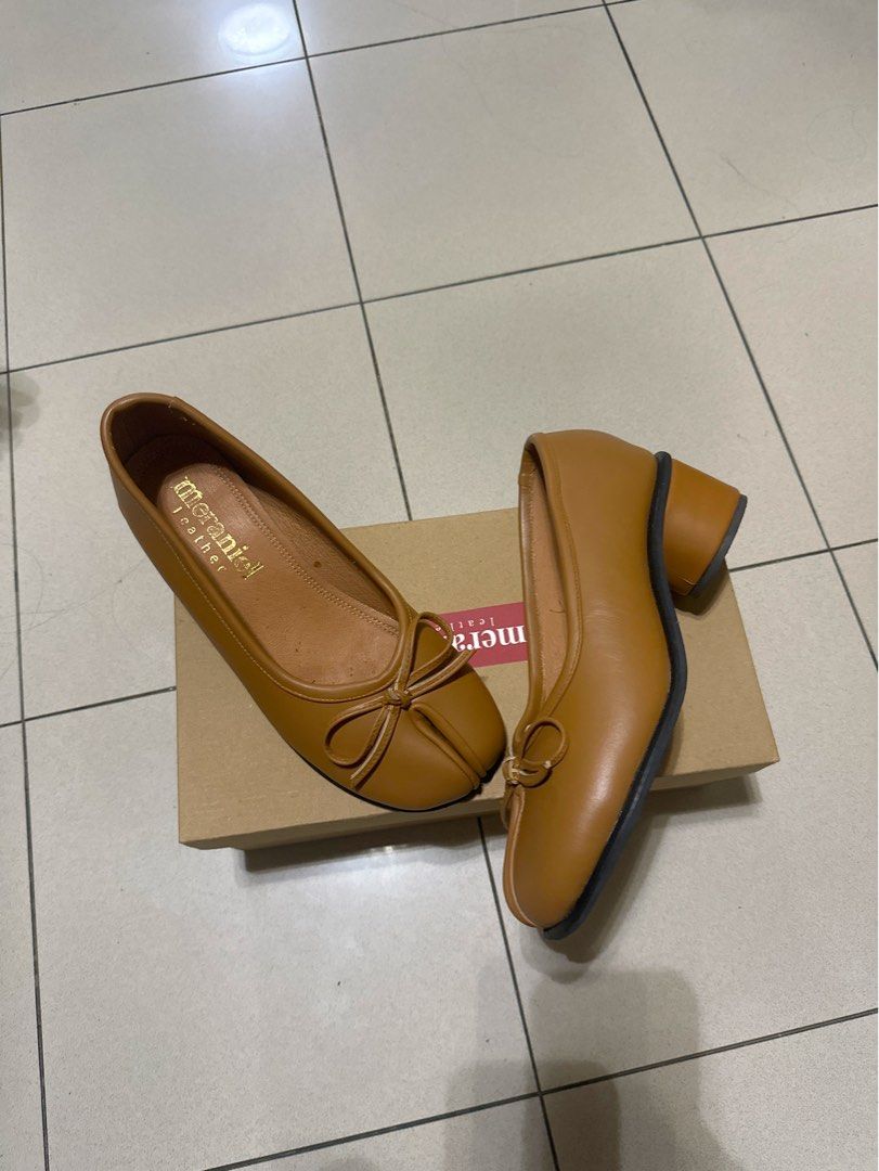 Meraniel Genuine Leather Tabi Brown Bow Heels (Category: Heels) located in Quezon City. Submitted by shopfinesse (Listing ID 1448423131, Image 3). Description: - Brand: Meraniel - Color: Brown - Material: Genuine - Tabi shoes! - Design: Cute bow detail on the front - Heel Type: Block heel for comfort and stability - Style: Easy slip-on - Occasion: Great for work or casual outings - Condition: Comes with original box - RFS: Wrong size :(.