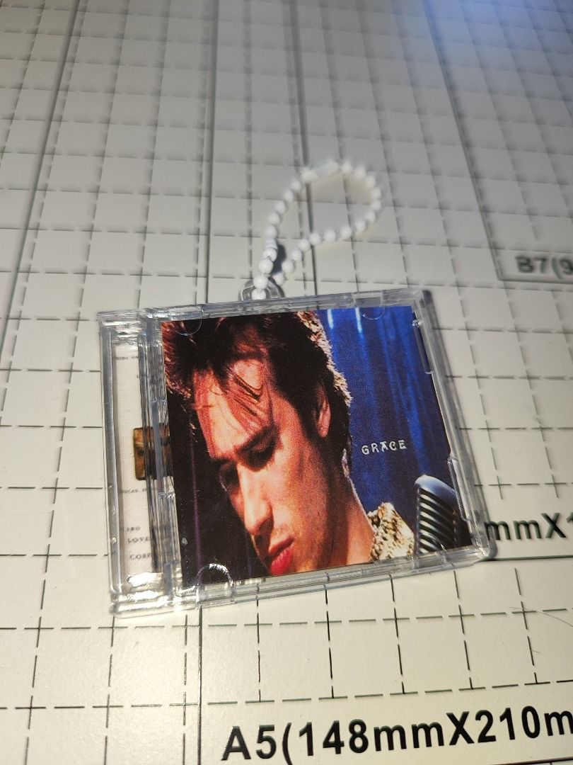 Mini Jeff Buckley: Grace NFC Keychains (Category: CDs & DVDs) located in Caloocan City. Submitted by nfcminicdkeychainsbytin (Listing ID 1448417729, Image 1). Description: - Miniature CD album keychain featuring Jeff Buckley's iconic 'Grace' album. - The CD itself is playable, a unique collectible! - Comes with a stylish beaded strap for easy carrying. - Ideal gift for Jeff Buckley fans or music memorabilia enthusiasts. - Small, portable, and a g