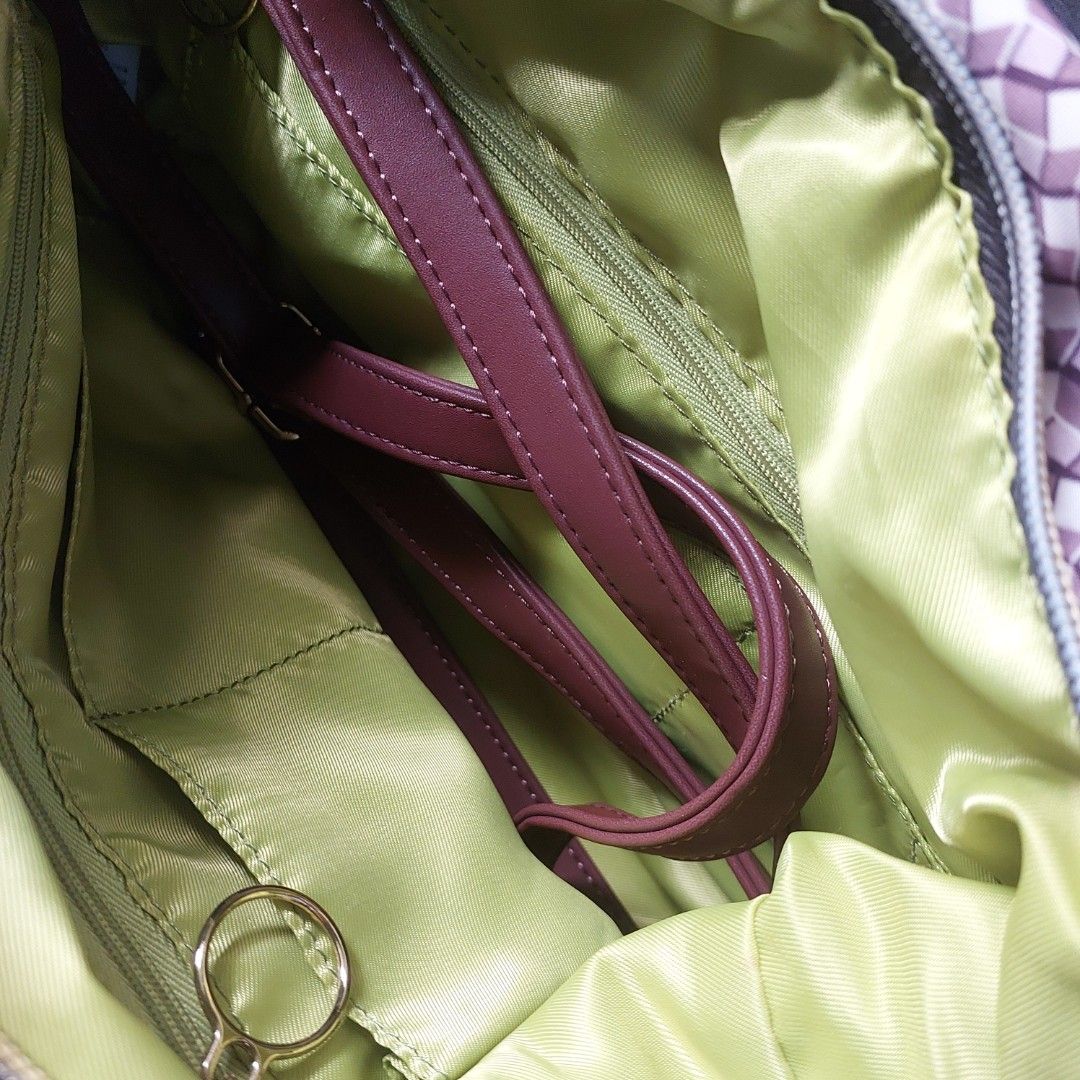 Monogram Crossbody bag (Category: Luxury Bags & Wallets) located in Taytay. Submitted by beelovedthings (Listing ID 1448325272, Image 2). Description: - Adorable monogrammed handbag - Maroon color with neon green interior - Durable brown leather handles and trim - Secure zipper closure.