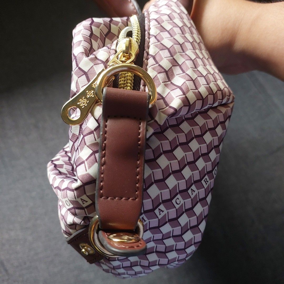 Monogram Crossbody bag (Category: Luxury Bags & Wallets) located in Taytay. Submitted by beelovedthings (Listing ID 1448325272, Image 3). Description: - Adorable monogrammed handbag - Maroon color with neon green interior - Durable brown leather handles and trim - Secure zipper closure.