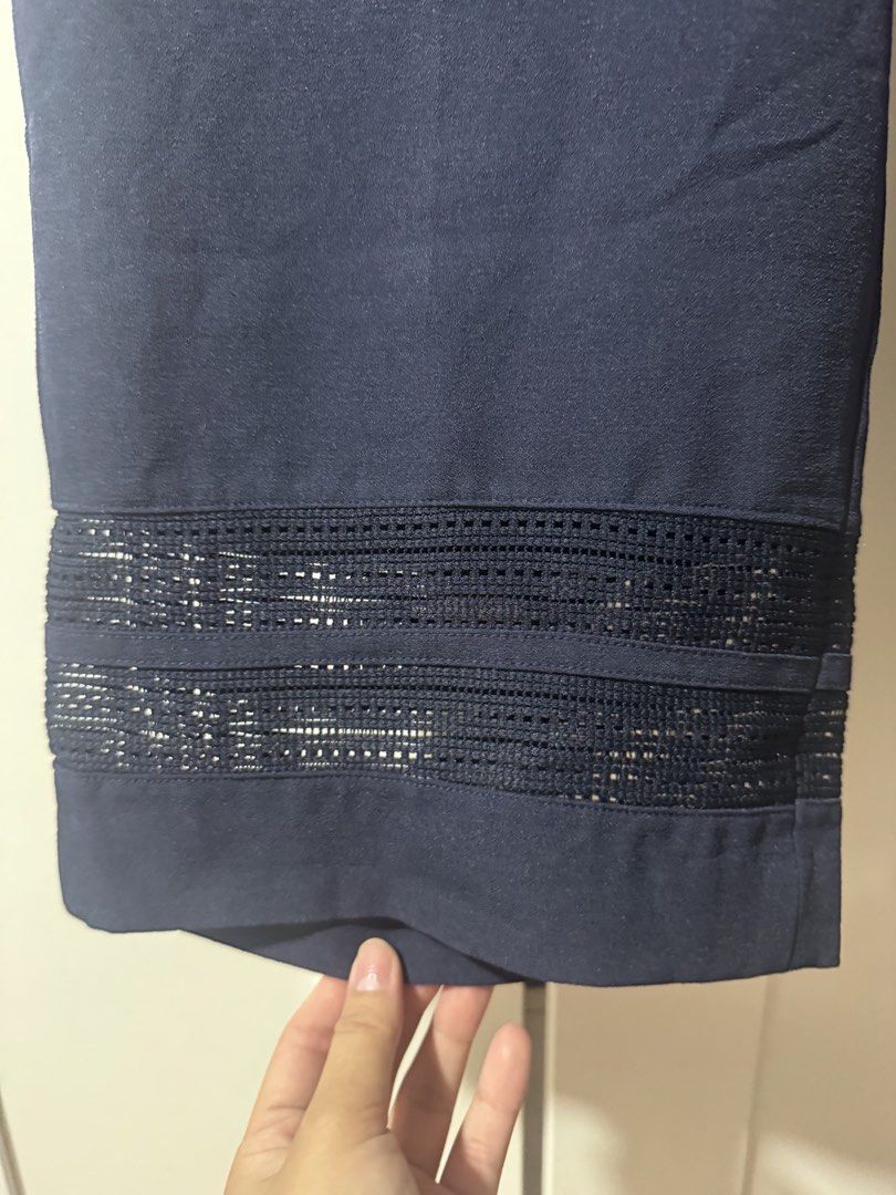 Navy Blue Capri Pants with Lace Trim (Category: Other Bottoms) located in Taguig. Submitted by olivia0907 (Listing ID 1448388865, Image 2). Description: - Navy blue capri pants - Cropped length - Wide waistband - Beautiful lace trim detail at the hem - Perfect for dressing up or down MOP: Gcash/BPI/BDO.