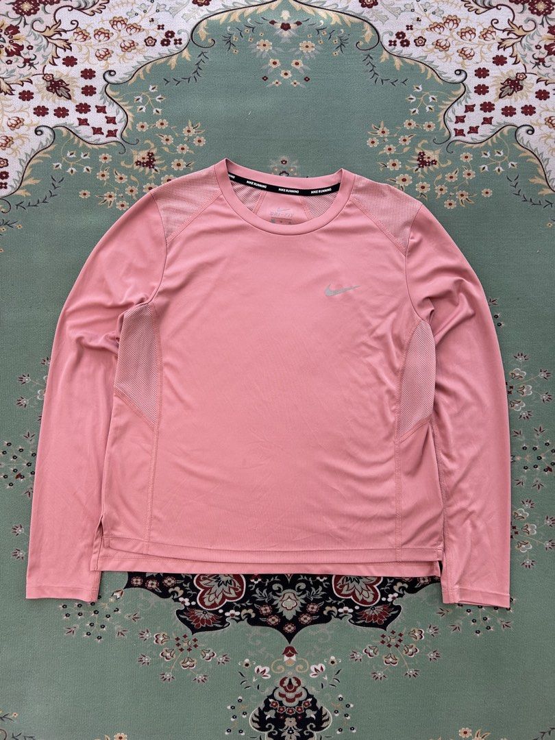 Nike Running Dri-fit Longsleeves (Category: Activewear) located in Angeles City. Submitted by outboxph (Listing ID 1448432683, Image 2). Description: CODE: Pi14 Authentic/Legit with tag and wash tag Size: XL on tag (best fit to small) Dimensions: 22.5L x 20W Back Part: 23.5L Sleeve Length: 24L Condition: 9/10 .