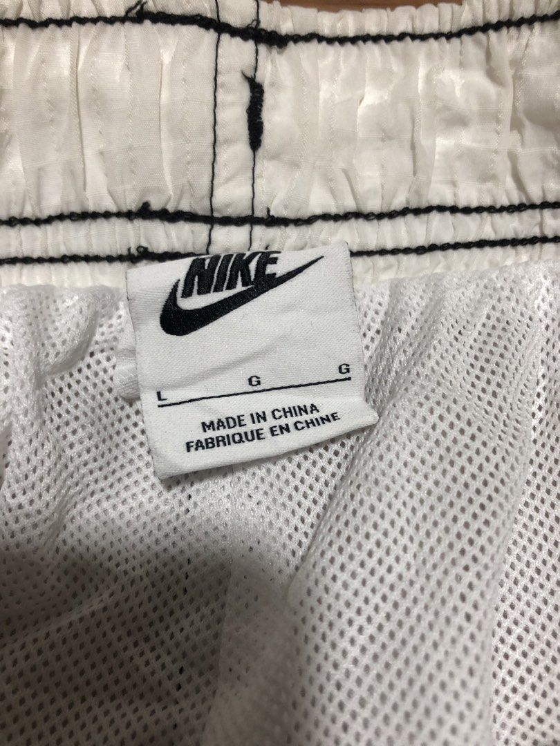 Nike White Track Pants Joggers Size L (Category: Joggers) located in Quezon City. Submitted by yeahsource222 (Listing ID 1448419543, Image 3). Description: - White Nike track pants - Size L - Classic Nike swoosh logo on both legs - Elastic waistband with adjustable drawstring - Two side pockets - Two cargo pockets - Inner mesh lining - Made in China.