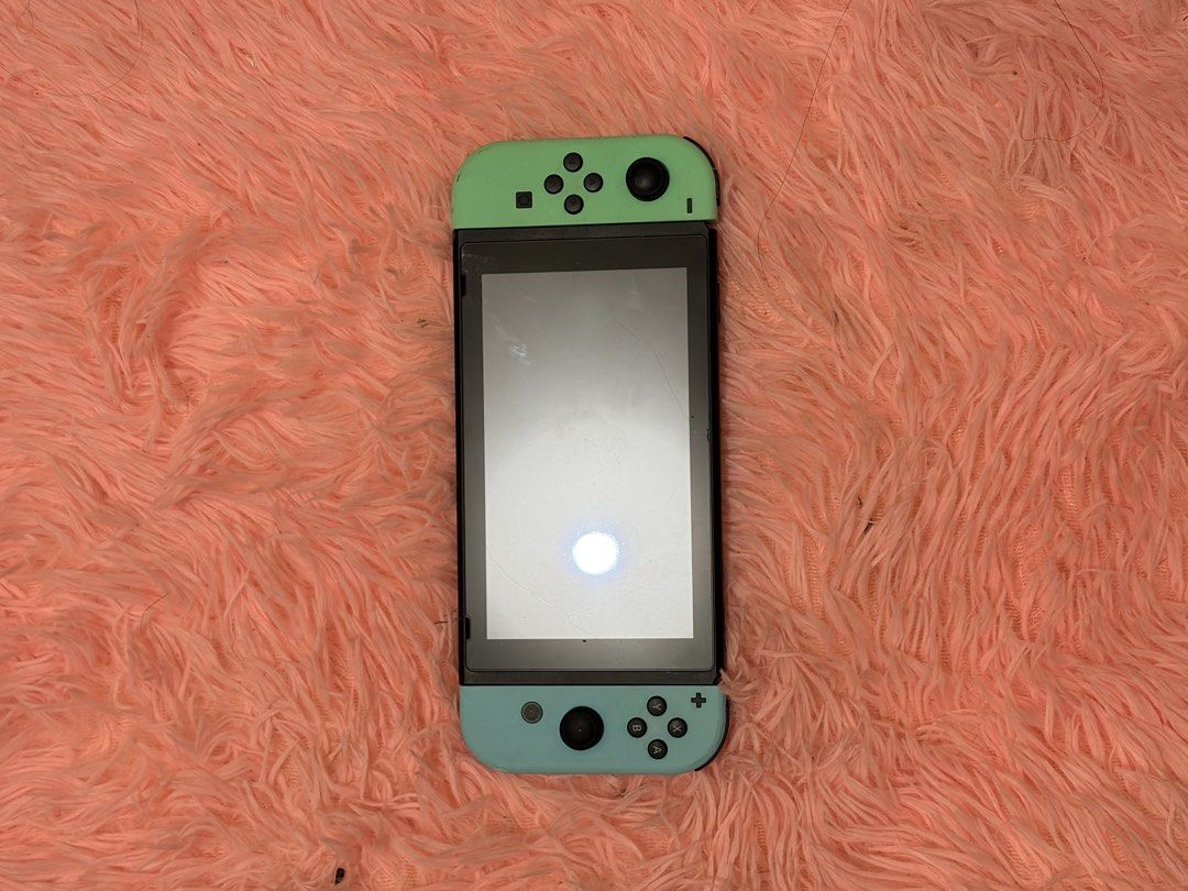 Nintendo Switch Joy-Cons - Pastel Blue and Green (Category: Nintendo) located in Manila. Submitted by dapdappung (Listing ID 1448331722, Image 1). Description: - Authentic Nintendo Switch Joy-Cons - Color: Pastel Blue & Pastel Green - Versatile: Attach to console or use wirelessly - Ideal for multiplayer gaming - Condition: Minor scuffs on screen area (normal use), fully functional.