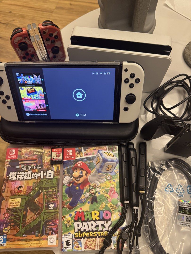 NINTENDO SWITCH OLED (Category: Nintendo) located in Kota Kinabalu. Submitted by guess1224mm (Listing ID 1448291321, Image 1). Description: * Nintendo Switch OLED White * Original Dock * Original Charger * HDMI Cable * Joy-Con charger 4pot * Joy-Con grip-4pcs * Joy-con controller-1pc * Joy-Con (1set extra ) * Carrying Case * 128GB microSD Card * Mario Party Superstars (Physical) * Pokémon Shield (Physical) * Crayon Shin-chan: Shiro of Coal Town (