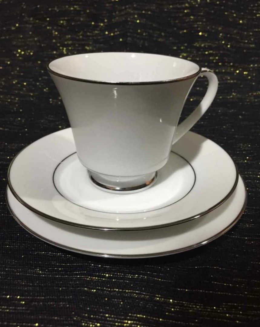 Noritake Regency Silver Fine China 18 Piece Tea Set (Category: Coffee & Tea Tableware) located in Cainta. Submitted by veronica2277 (Listing ID 1448295451, Image 2). Description: - 18-piece vintage Noritake Regency Silver fine china tea set (still in box) - From The Debenhams Collection bought in UK - Includes: 6 tea cups, 6 saucers, 6 tea plates - Classic white design with elegant silver trim - Ideal for serving guests or for special occasions.