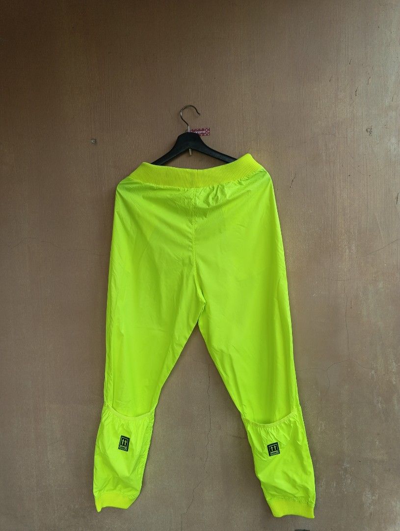 Off White Neon Track Pants (Category: Activewear) located in Lipa City. Submitted by MEECHYTWO2TWO (Listing ID 1448298752, Image 1). Description: • OFF WHITE NEON TRACK PANTS - Size: 38 / Best fit Large - Waistline 30-36 - Length: 40 - Location: Lipa City, Batangas - Excellent condition - Color rate: 10/10 - Additional sf +75 - Mop: GCASH/NO COD - Payment first tomorrow will be shipped.
