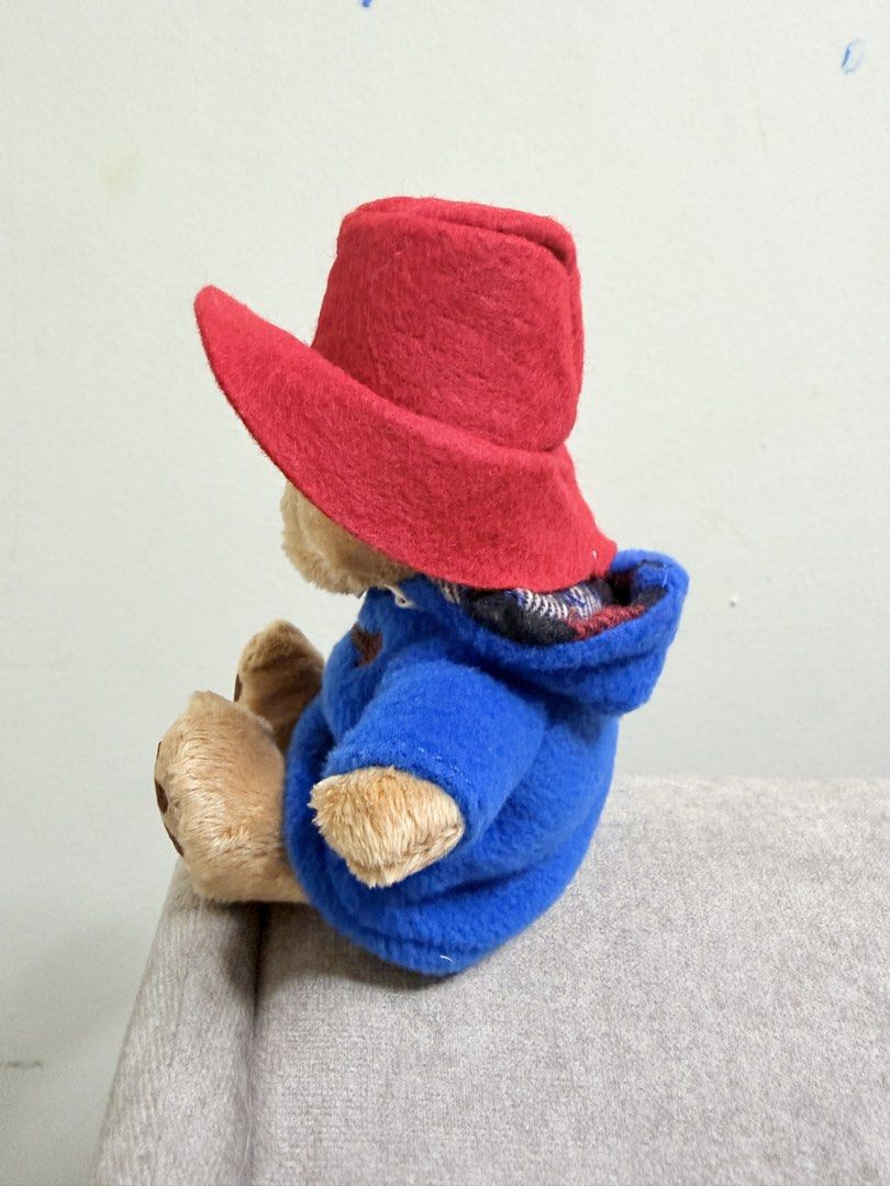 Original Paddington Bear Plush Toy with Red Hat and Blue Coat (Category: Toys & Games) located in Kuala Lumpur. Submitted by di12345 (Listing ID 1448356404, Image 2). Description: - Adorable Paddington Bear plush toy - Features iconic blue duffle coat and red hat - Brand new with tag attached (Rainbow Designs) - Approximately 6 inches tall - Ideal for Paddington enthusiasts or as a thoughtful gift.