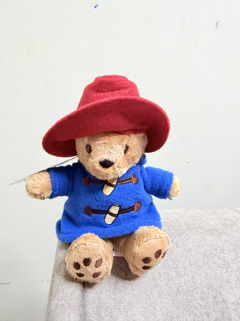 Original Paddington Bear Plush Toy with Red Hat and Blue Coat (Category: Toys & Games) located in Kuala Lumpur. Submitted by di12345 (Listing ID 1448356404, Image 1). Description: - Adorable Paddington Bear plush toy - Features iconic blue duffle coat and red hat - Brand new with tag attached (Rainbow Designs) - Approximately 6 inches tall - Ideal for Paddington enthusiasts or as a thoughtful gift.