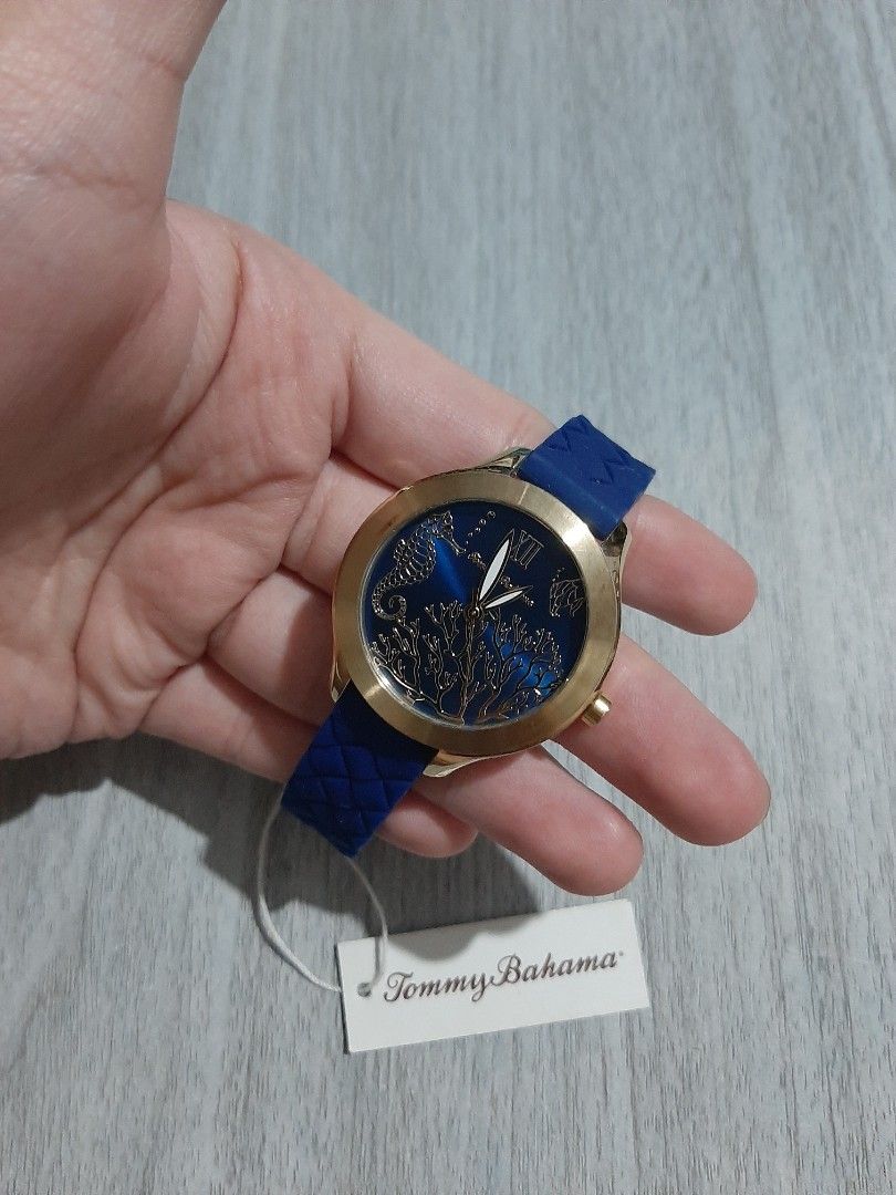 Original Tommy Bahama Unisex Watch (Category: Women's Watches) located in Mandaluyong City. Submitted by time_machine28 (Listing ID 1448370868, Image 2). Description: SALE... SALE... SALE SALE... SALE... SALE 1,860 pesos only original / legit brand new condition 9/10 ratings selling low watch only no issues gold tone blue dial blue silicon strap fits up to 7.5 inches wrist bought in us srp $125 size 36mm mandaluyong here mop: BDO or gcash courier