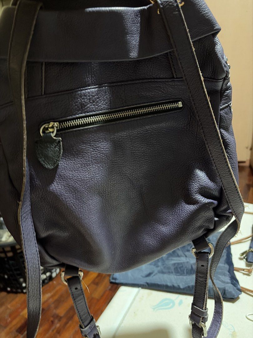 ORYANY Purple Leather Backpack (Category: Backpacks) located in Las Pinas. Submitted by ces0427 (Listing ID 1448281694, Image 2). Description: - Genuine purple leather backpack from ORYANY - Multiple zippered compartments (front and back) - Interior with stylish patterned lining - Adjustable straps for a comfortable fit - Ideal for everyday use and travel - very soft leather.