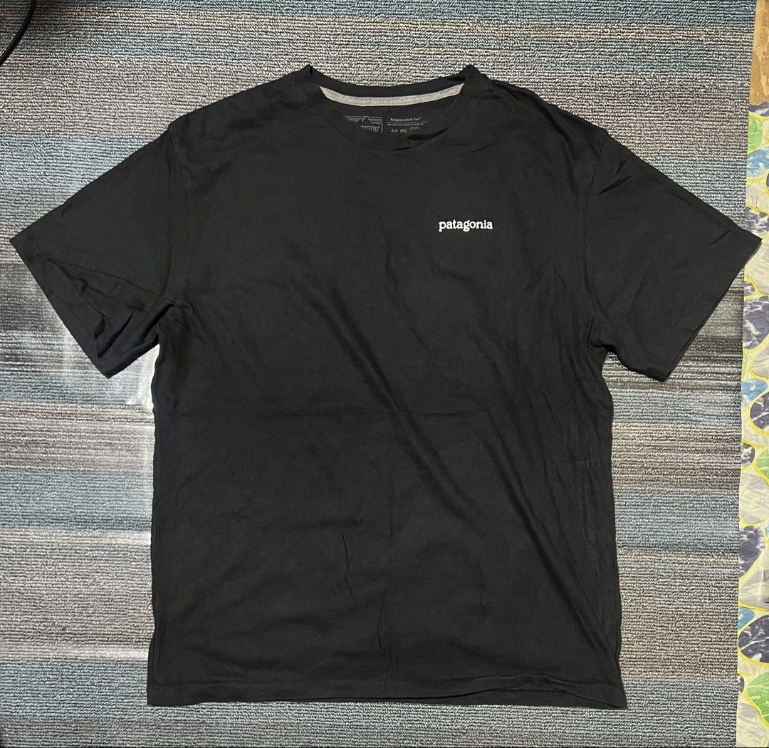 Patagonia Tshirt Black (Category: Tshirts & Polo Shirts ) located in Cebu City. Submitted by mark24anth29233 (Listing ID 1448280535, Image 2). Description: Authentic Size: Large W21.5x28 Very good condition Color rate: 9.5/10 Issue: cut wash tag .