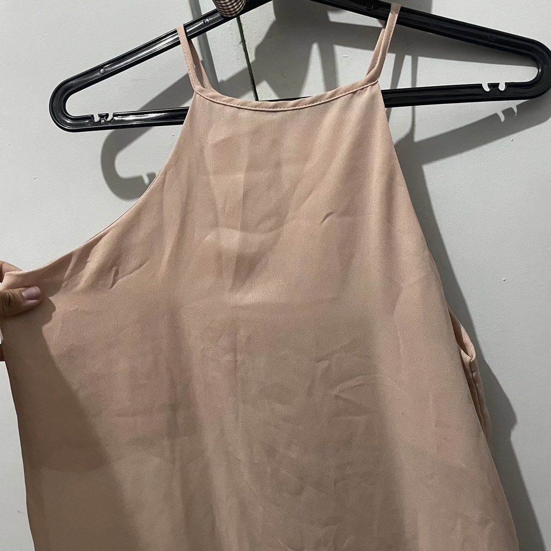 Peach Halter Neck Sleeveless Top (Category: Sleeveless) located in Quezon City. Submitted by declutteriea (Listing ID 1448434774, Image 2). Description: notes: - never worn! - very flowy material - no when worn pics :) mop: gcash mod: j&t, flash, ggx.