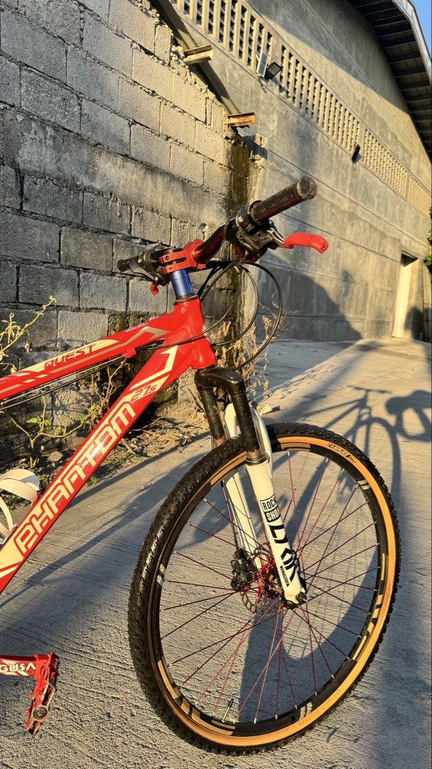 Phantom by trinx Bike (Category: Bicycles) located in Tarlac. Submitted by ethncip (Listing ID 1448355932, Image 3). Description: specs: - phantom frame - compass skinwall tires - saturn atlas v2 hub 6pawls - shimano cogs - shimano altus fd - shimano mt200 hydraulic brakes - 9 speed ltwoo A5 rd and shifter - fork and seat are stock - ragusa crank freebie rnox helmet naka bike skin, maingay ang hubs and takaw pansin sa daan note: decals lang yung 
