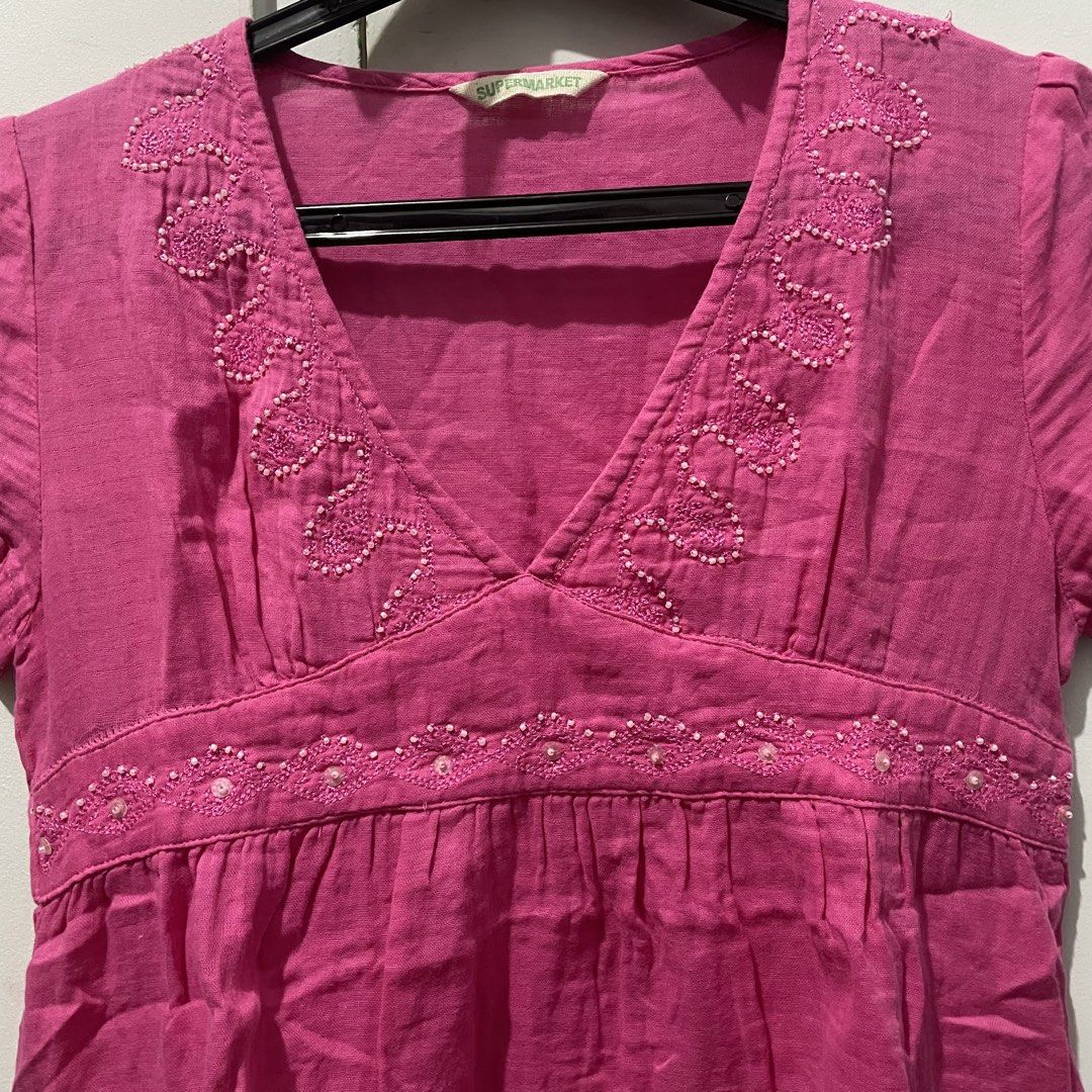 Pink Beaded Embroidered V-Neck Top (Category: Blouses) located in Quezon City. Submitted by declutteriea (Listing ID 1448434458, Image 2). Description: notes: - super cute bead details - no when worn pics :) mop: gcash mod: j&t, flash, ggx.