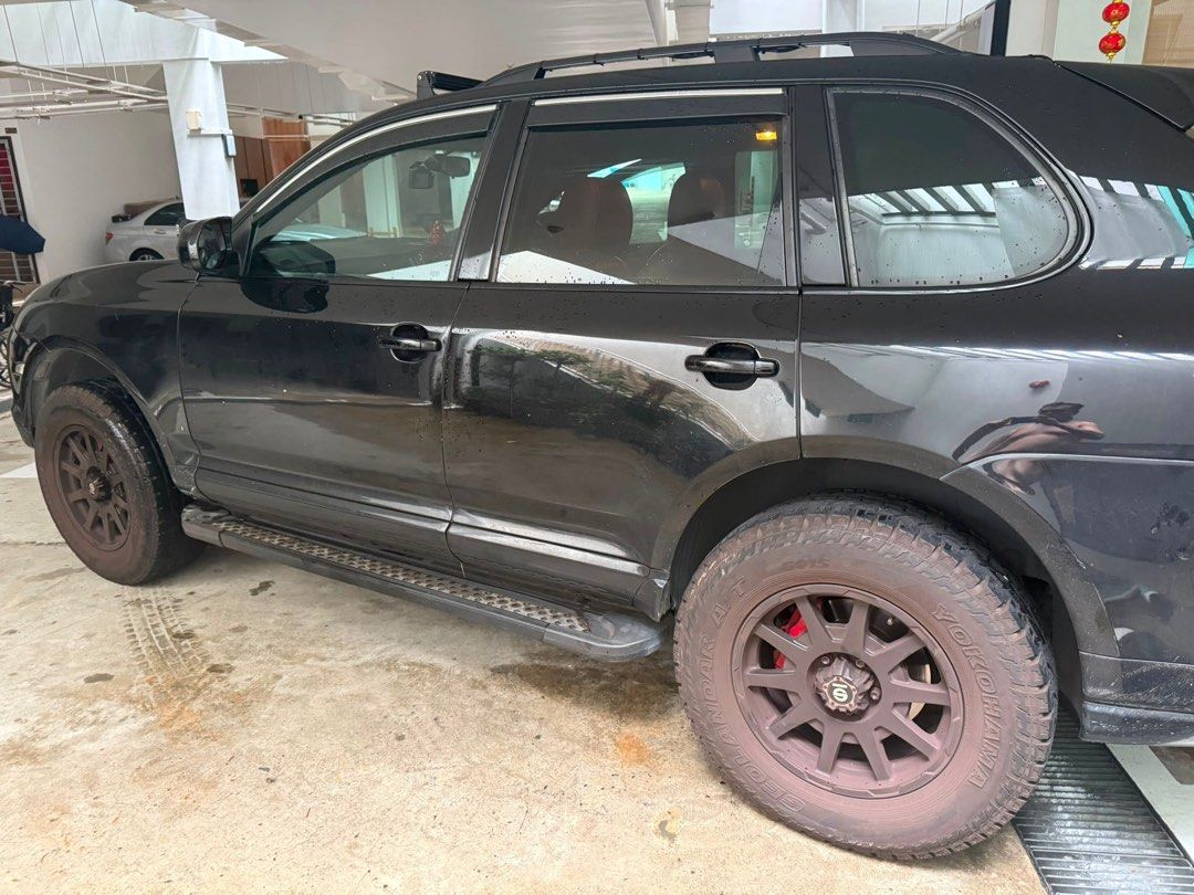 Porsche Cayenne 3.0 (A) (Category: Used Cars) located in Singapore. Submitted by andylau67 (Listing ID 1448425952, Image 2). Description: Black Porsche Cayenne. Red leather interior. Aftermarket wheels and tires. Sunroof. Tinted windows. Plenty of space in the back. Ready for a new owner. Contact me for more details..