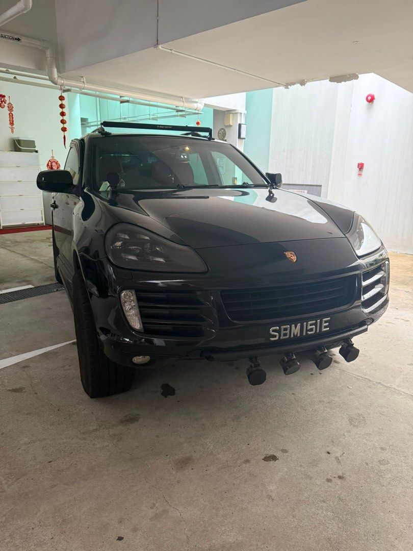 Porsche Cayenne 3.0 (A) (Category: Used Cars) located in Singapore. Submitted by andylau67 (Listing ID 1448425952, Image 1). Description: Black Porsche Cayenne. Red leather interior. Aftermarket wheels and tires. Sunroof. Tinted windows. Plenty of space in the back. Ready for a new owner. Contact me for more details..