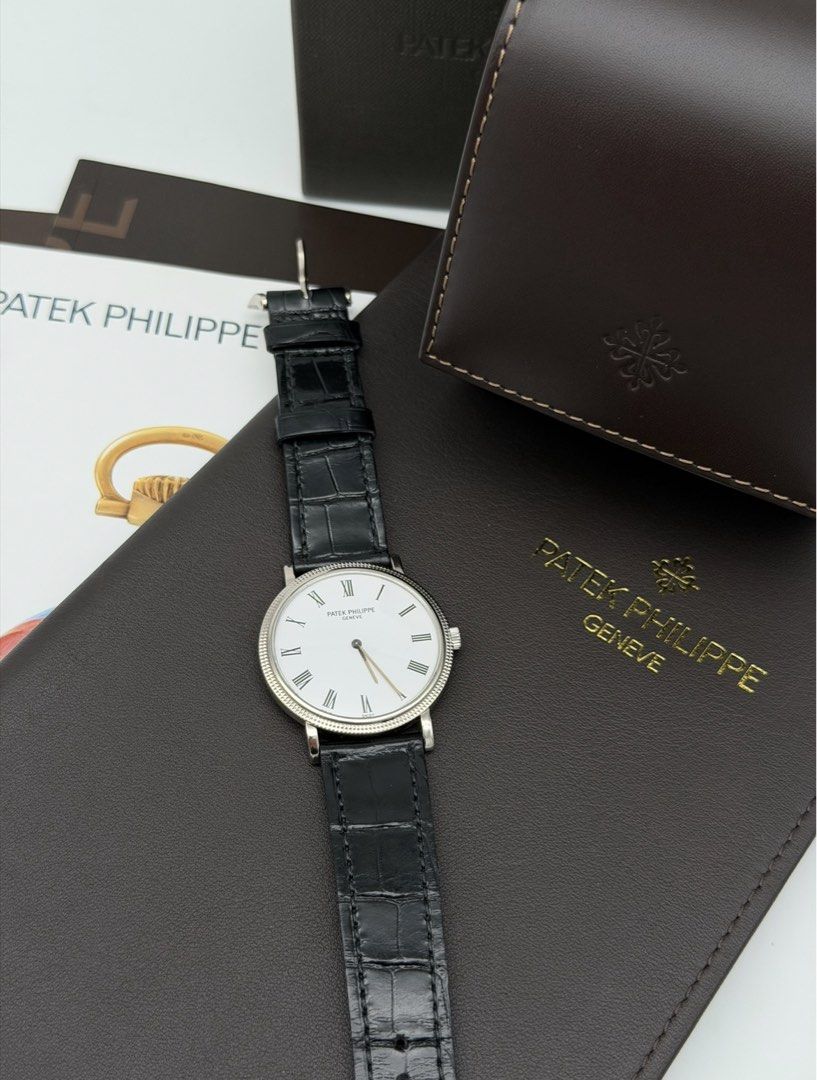Rare Patek Philippe Calatrava 18k White Gold Automatic (Category: Luxury Watches) located in Manila. Submitted by timelesseleganceph (Listing ID 1448355194, Image 2). Description: Rare Patek Philippe Calatrava 18k White Gold Automatic Reference 5120G-001 Size 35mm Dated Aproximate 2005-2010 Automatic Movement NOT Manual Wind Brandnew Strap from Patek worth 40k with Receipt Lacquered White Dial with Black Roman Numerals in Full 18k White Gold Beze