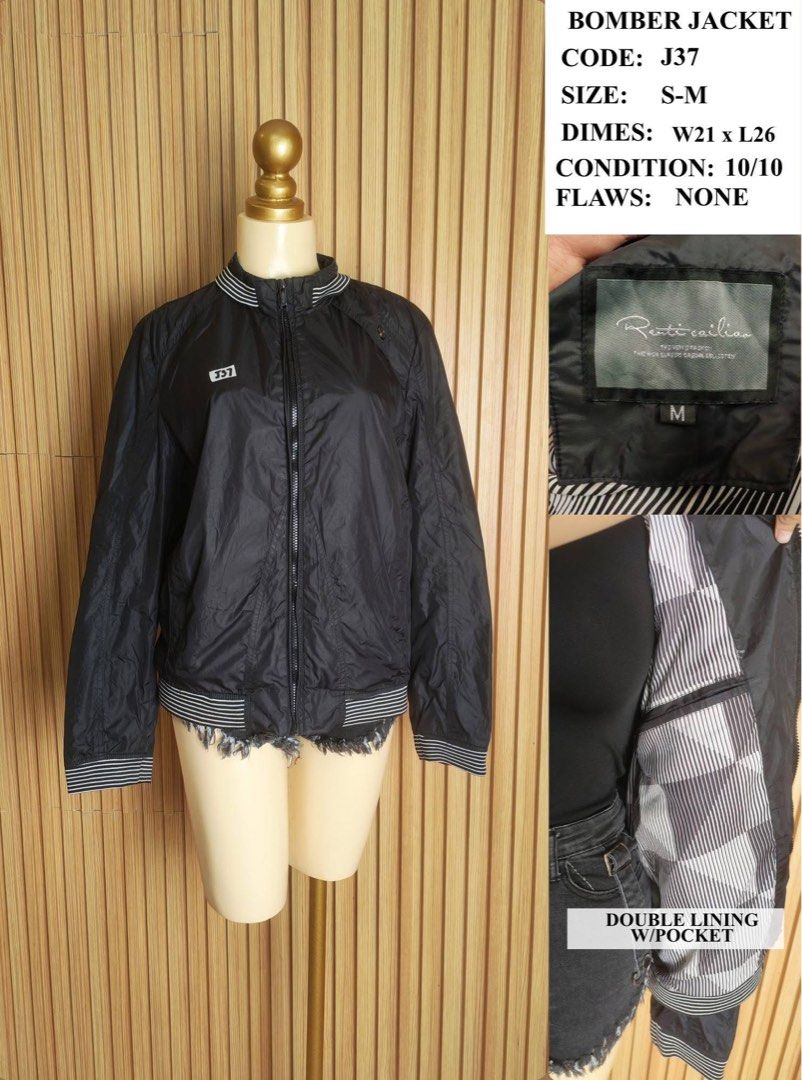 Ratti Cailian Bomber Jacket S-M Black Double Lining (Category: Coats, Jackets and Outerwear) located in Caloocan City. Submitted by kmjs_2024 (Listing ID 1448341116, Image 1). Description: - Brand: Ratti Cailian - Style: Black Bomber Jacket - Size: Fits S-M - Features: Double lining, inner pocket - Details: Striped cuffs and collar - Condition: Brand new, no flaws - Perfect for: Casual everyday wear.