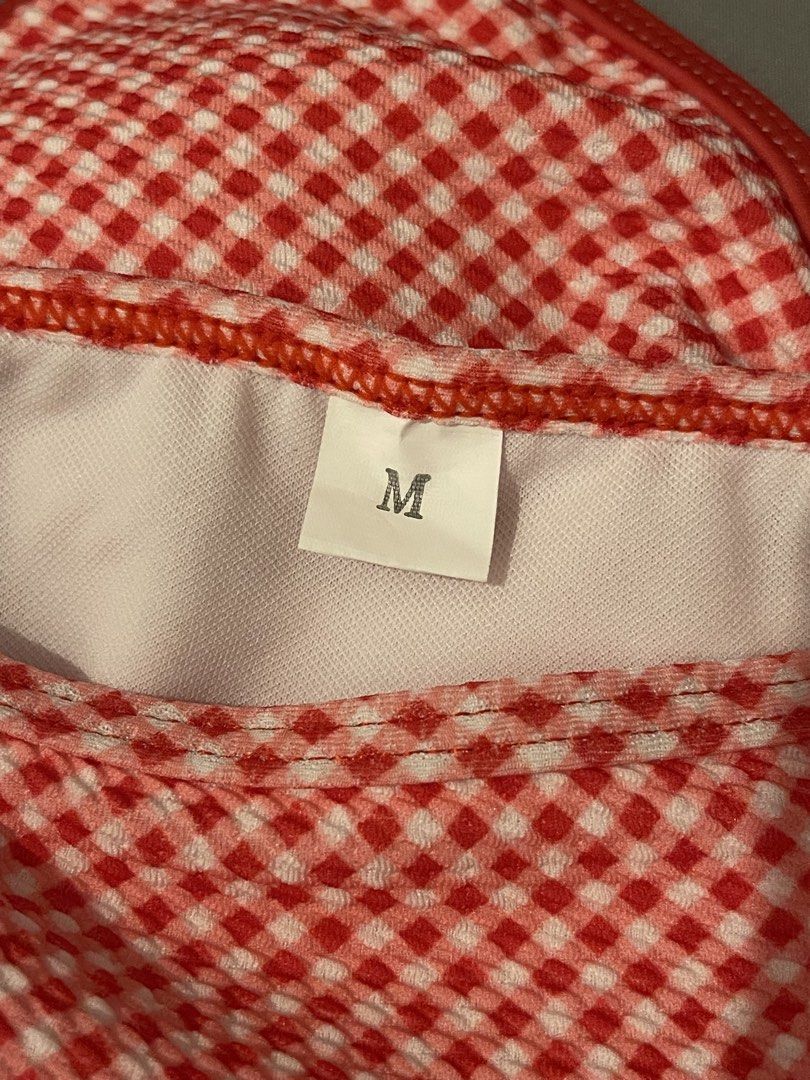 Red Gingham Triangle Bikini Set (Category: Bikinis & Swimsuits) located in Mandaluyong City. Submitted by lovxlle (Listing ID 1448397925, Image 2). Description: Brand new, cute red and white gingham bikini, size M. Triangle top and tie-side bottoms for adjustable fit. Perfect for beach or pool. Comes with padding inside the bikini top. Rfs: bought the wrong size online. Delivery via Lalamove or GrabExpress.