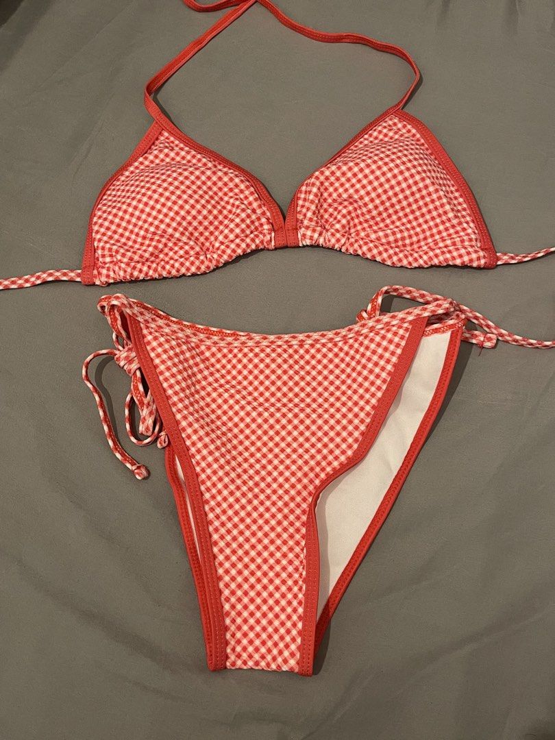 Red Gingham Triangle Bikini Set (Category: Bikinis & Swimsuits) located in Mandaluyong City. Submitted by lovxlle (Listing ID 1448397925, Image 1). Description: Brand new, cute red and white gingham bikini, size M. Triangle top and tie-side bottoms for adjustable fit. Perfect for beach or pool. Comes with padding inside the bikini top. Rfs: bought the wrong size online. Delivery via Lalamove or GrabExpress.