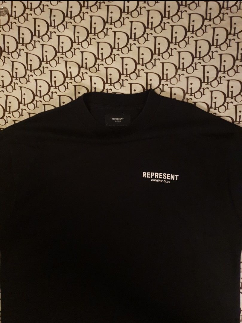 Represent mullet type tee (Category: Tshirts & Polo Shirts ) located in San Fernando. Submitted by retro.district. (Listing ID 1448464972, Image 3). Description: - Represent mock neck tee - SIZE: XL - XXL - minimal hairlines - Metal Hardware logo still intact.