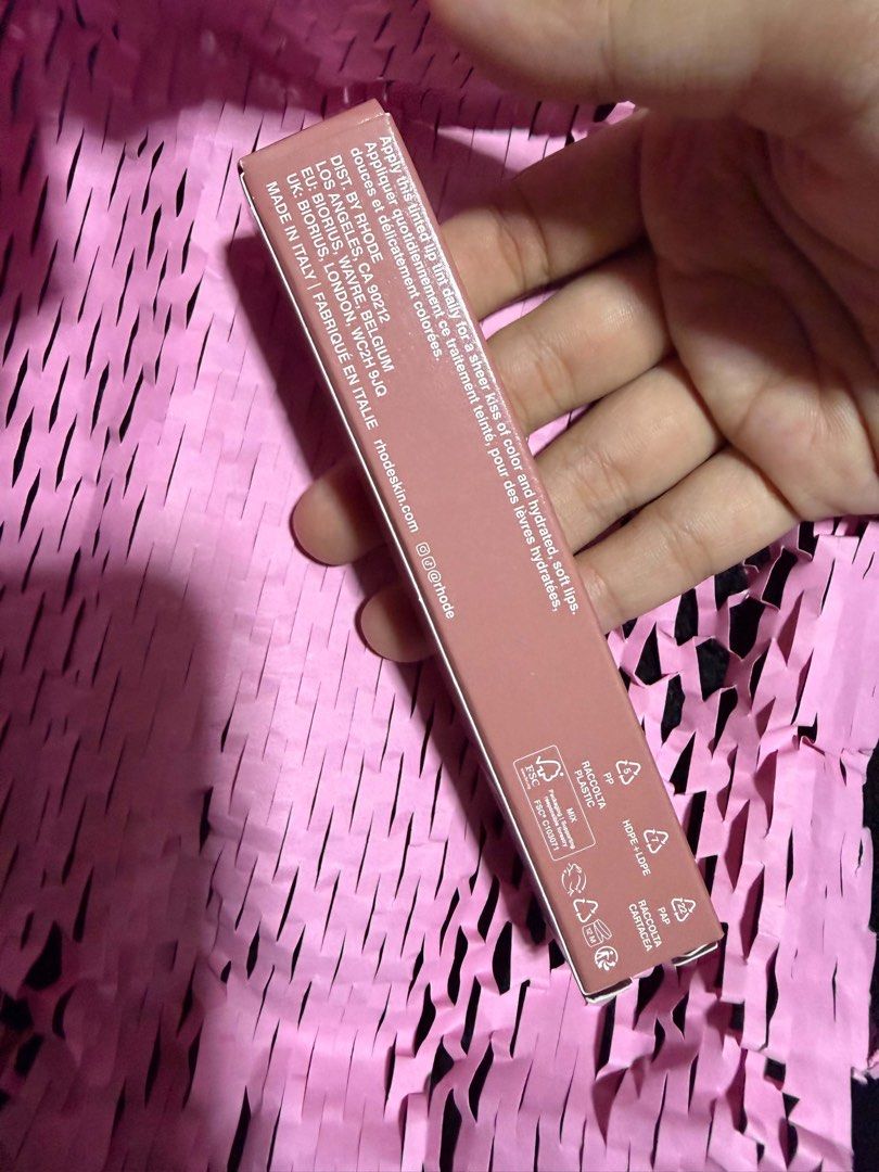 Rhode Peptide Lip Tint in Toast (Category: Makeup) located in Paranaque City. Submitted by khimahri.clst (Listing ID 1448395386, Image 2). Description: - Rhode Peptide Lip Tint in shade 'Toast' - Tinted lip balm for color and hydration - Nourishing formula to keep lips healthy - Perfect for a natural, everyday look - Comes in convenient tube packaging.