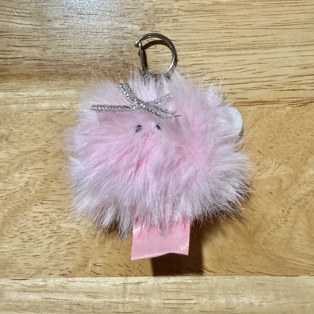 Rom&nd x Neonmoon Mini Pink Dusty Keychain Charm (Category: Designer & Blind Box Toys) located in Pasig City. Submitted by d.macncheese (Listing ID 1448357625, Image 1). Description: - Bought from South Korea Rom&nd store - Comes in original plastic and capsule packaging; opened only to take photos 📍Pasig.