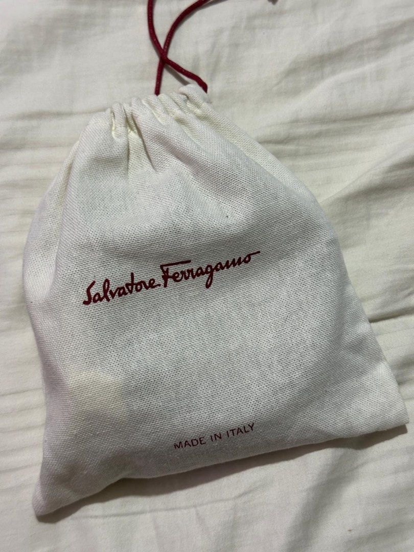 Salvatore Ferragamo Gancini Belt Reversible (Category: Belts) located in Paranaque City. Submitted by consumptionqueen18 (Listing ID 1448359475, Image 3). Description: - Authentic Salvatore Ferragamo belt - Iconic Gancini buckle - Reversible design: Black on one side, Brown on the other - Made in Italy - Comes with original dust bags for belt + Buckle - Perfect accessory to elevate any outfit !! PRICE IS NEGOTIABLE !! RFS : Not being used.