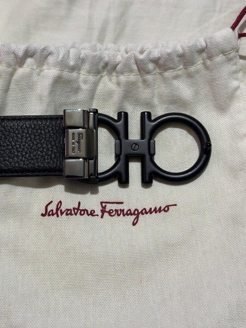 Salvatore Ferragamo Gancini Belt Reversible (Category: Belts) located in Paranaque City. Submitted by consumptionqueen18 (Listing ID 1448359475, Image 2). Description: - Authentic Salvatore Ferragamo belt - Iconic Gancini buckle - Reversible design: Black on one side, Brown on the other - Made in Italy - Comes with original dust bags for belt + Buckle - Perfect accessory to elevate any outfit !! PRICE IS NEGOTIABLE !! RFS : Not being used.