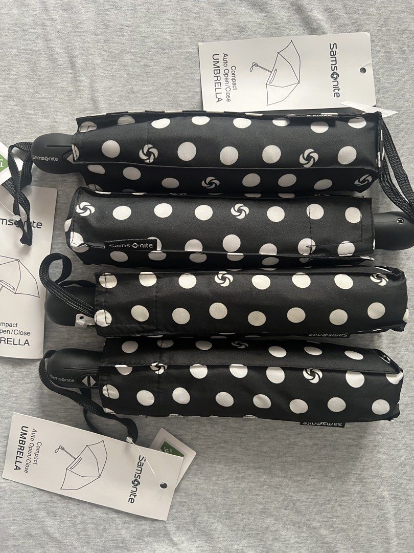 Samsonite Compact Auto Open/Close Polka Dot Umbrella (Category: Umbrellas) located in Muntinlupa City. Submitted by 09leah77 (Listing ID 1448283896, Image 1). Description: - Black umbrella with cute white polka dots - Compact and easy to carry - Auto open and close feature for convenience - Made with Teflon fabric for excellent water repellency - Includes a handy wrist strap - Ideal for keeping in your bag for sudden rain showers - 850.00 each - 