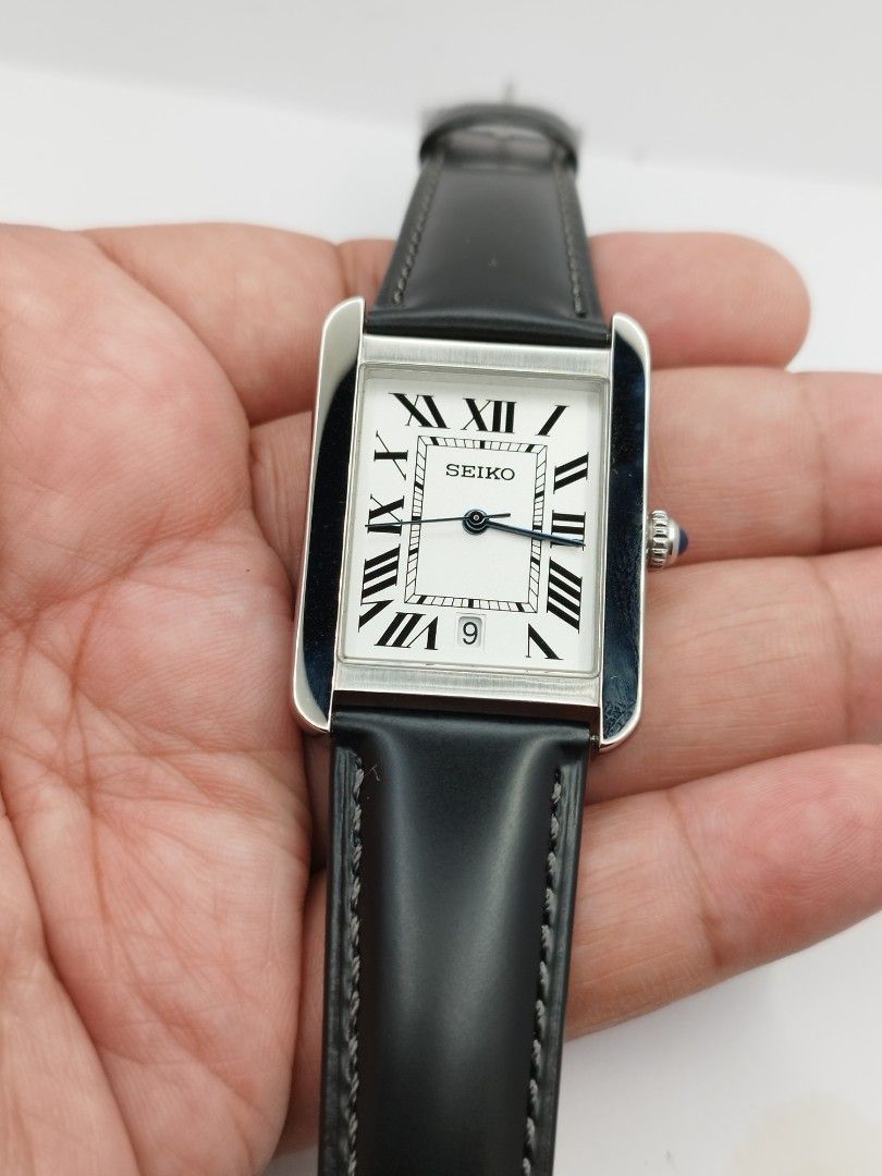 Seiko tank (Category: Men's Watches) located in Quezon City. Submitted by WatchProject (Listing ID 1448307888, Image 2). Description: original Seiko vj24 quartz movement 31mm case dm sapphire glass genuine leather with box and paper bag.