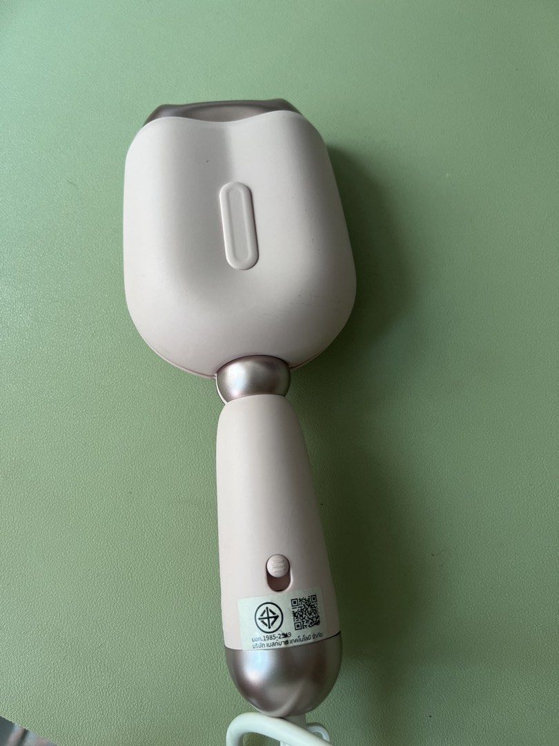Simplus Pink Automatic Hair Curler (Category: Hair) located in Malabon City. Submitted by jackiemochi (Listing ID 1448289180, Image 2). Description: - Brand: Simplus - Color: Pink - Type: Automatic Hair Curler - Heat Settings: 190°C, 210°C, 230°C - Power Source: Corded Electric - Features: Easy to use, creates beautiful waves, perfect for quick styling.