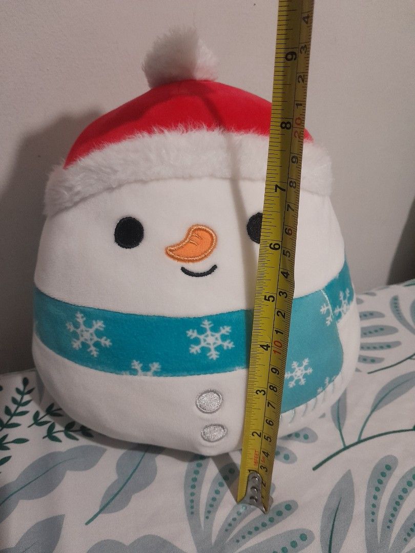 Squishmallows Galindo the Snowman (Category: Plushies & Soft Toys) located in Quezon City. Submitted by warmturtle.ba931b (Listing ID 1448323438, Image 2). Description: Squishmallows Galindo the Snowman ☃️ Character: Galindo the Snowman 📏 Approx. 10 inches tall 🤍 Super soft and squishy plush 🧣 Features a teal snowflake scarf and festive Santa hat 🧼 Clean, well-maintained, and in excellent condition 🏡 Stored properly; from a smoke-free home ✅