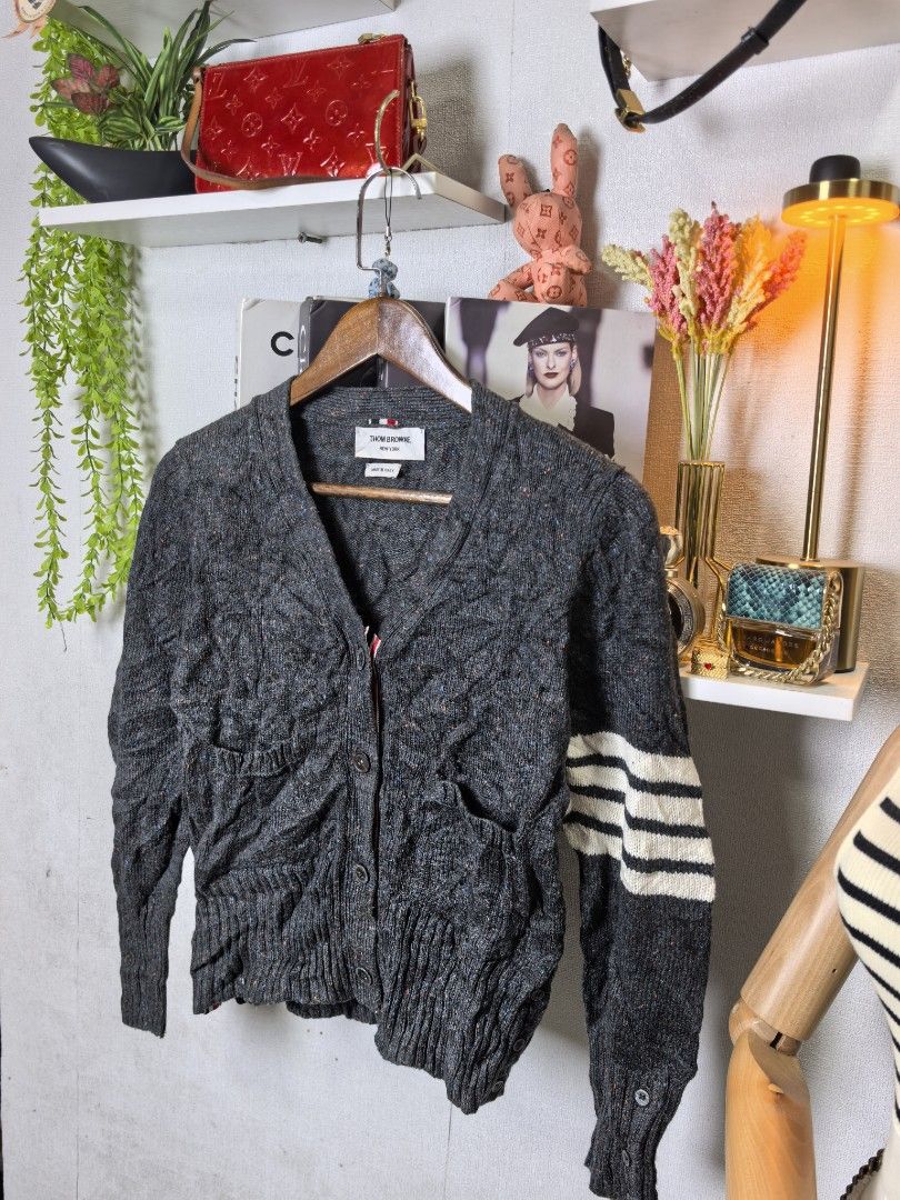 Thom Browne nitted cardigan (Category: Luxury Apparel) located in Baguio. Submitted by ashzachary (Listing ID 1448445494, Image 2). Description: Thom Browne nitted cardigan Condition :Excellent condition Color rate 10/10 Size :small semi Medium Inches:W18/L21 No issues No flaws Super ganda sa personal Pm. More details Good quality Plsss 📌No Bogus 📌No return MOP What you see is what you get PALAWAN, CEBUNA GCASH AND BDO Reminder😊 We're selling 
