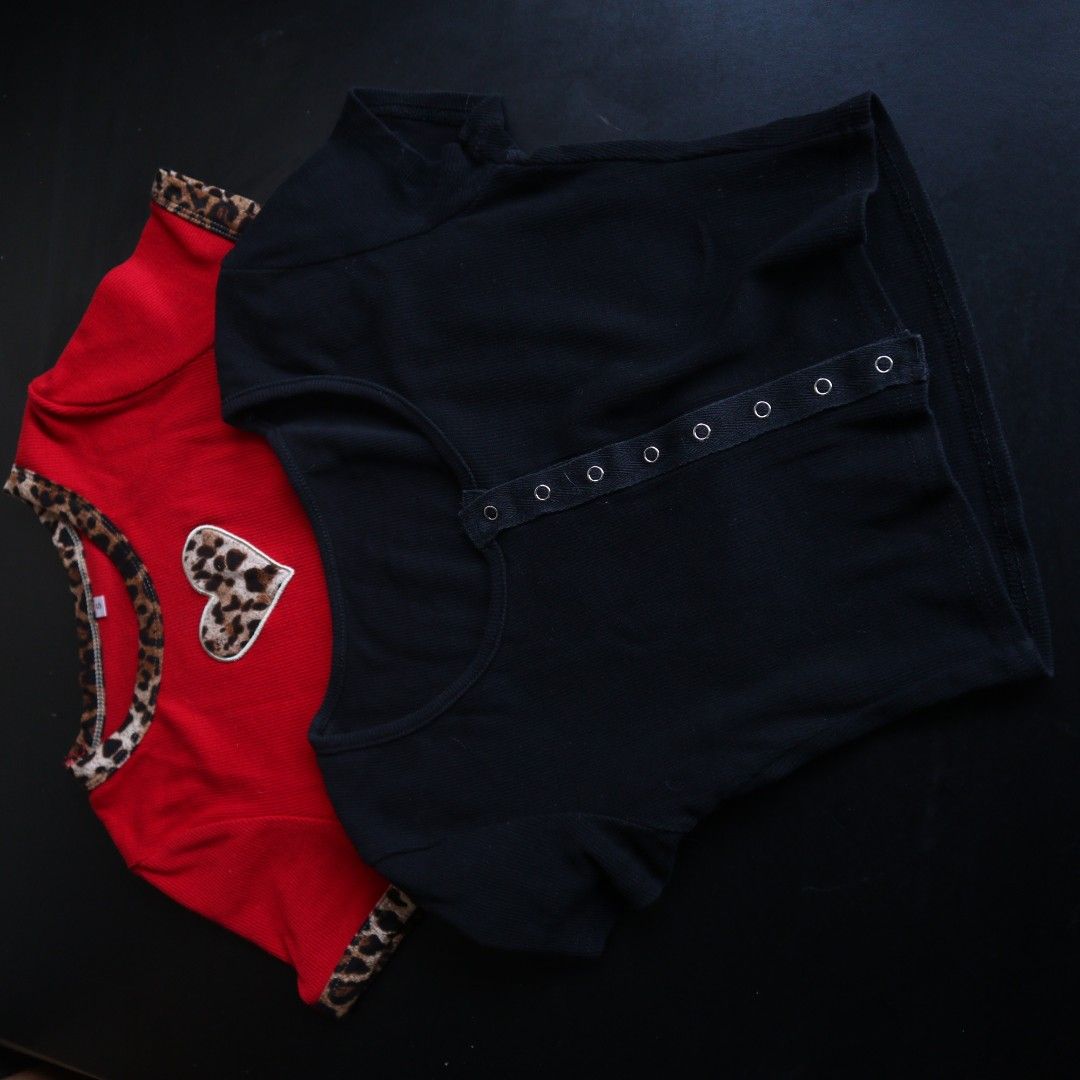 top bundle knitted crop top y2k (Category: Blouses) located in Manila. Submitted by busybuzzingbees (Listing ID 1448292436, Image 1). Description: Red stretchable knitted leopard lining crop top XS Width 11 Length 14in Black short sleeved knitted crew neck crop top with decorative buttons XS Width 11.5in Length 12in (ends right around at the bottom of my ribcage) Loc: Malate, Manila Can meet up around LRT 1 Quirino or Vito Cruz only Shipping thru
