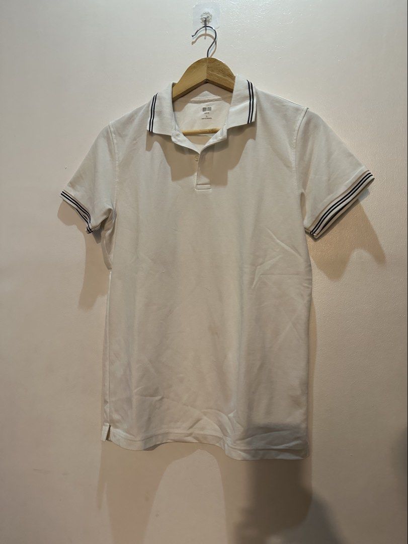 Uniqlo polo shirt (Category: Tshirts & Polo Shirts ) located in Quezon City. Submitted by heiressofpersia80 (Listing ID 1420679877, Image 1). Description: - Uniqlo polo shirt - Off-white color - Size: Large (fits Medium) - Slim fit design - Striped accents on sleeves - Condition: 4/5 .