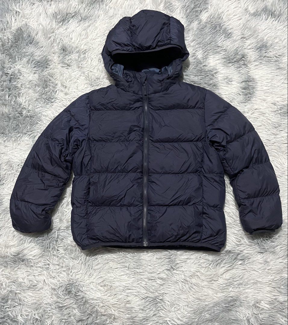 Uniqlo Ultra Light Down Puffer Jacket Kids (Category: Babies & Kids Fashion) located in Sasmuan (Sexmoan). Submitted by winterclothes.ph (Listing ID 1448387685, Image 1). Description: Uniqlo Ultra Light Down Puffer Jacket Kids 130 on tag Width 17 Length 19 Excellent Condition.