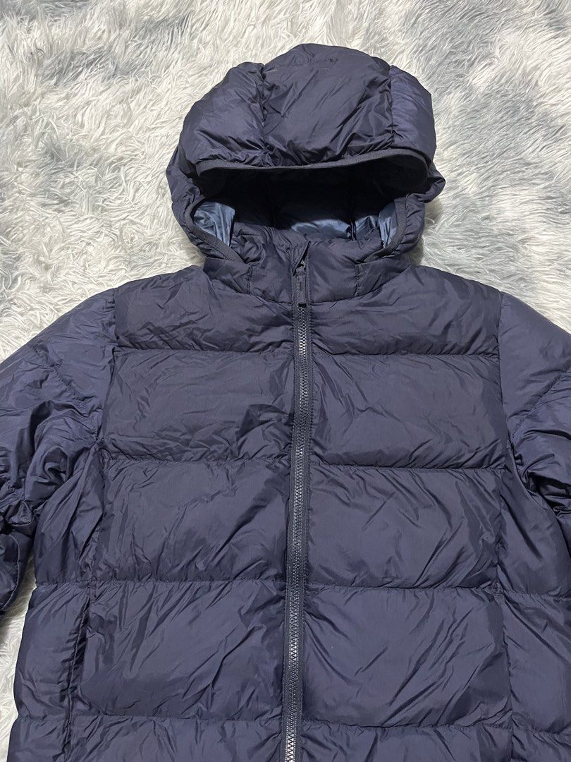 Uniqlo Ultra Light Down Puffer Jacket Kids (Category: Babies & Kids Fashion) located in Sasmuan (Sexmoan). Submitted by winterclothes.ph (Listing ID 1448387685, Image 2). Description: Uniqlo Ultra Light Down Puffer Jacket Kids 130 on tag Width 17 Length 19 Excellent Condition.