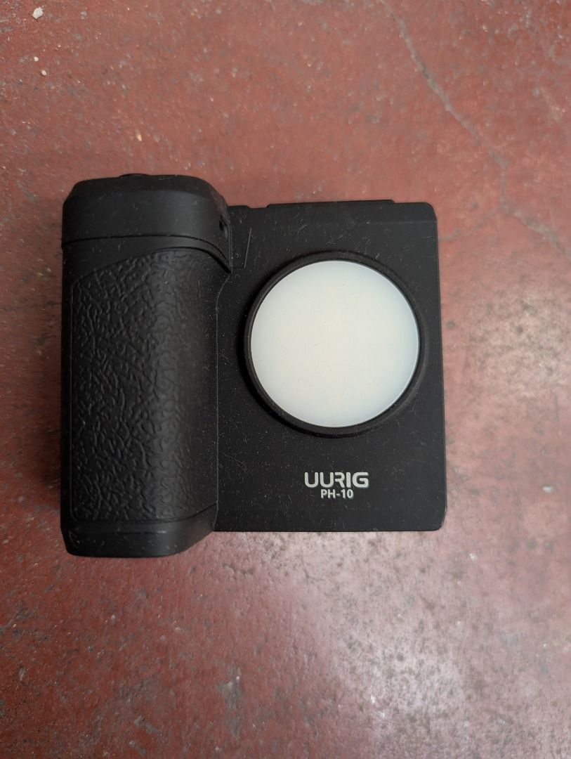 UURIG PH-10 Wireless Handle Grip Phone Holder Stabilizer for Smartphone (Category: Gimbals & Stabilizers ) located in Manila. Submitted by allyleighhh (Listing ID 1448367231, Image 1). Description: - Built in Led Light - with Cold Shoe Mount (for mic).