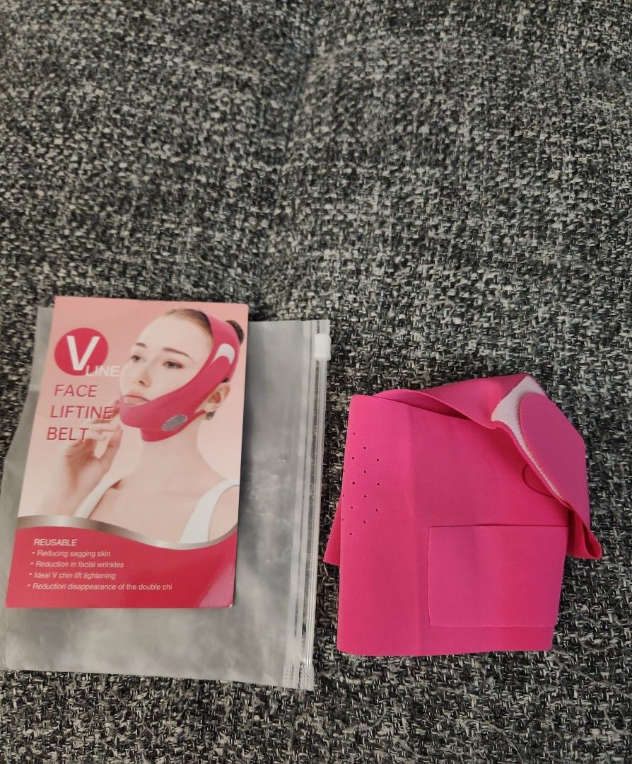 V Line Face Lifting Belt *NEW! (Category: Skin Care) located in North York. Submitted by real_reah (Listing ID 1448317912, Image 2). Description: This V Line Face Lifting Belt helps with reducing sagging skin and facial wrinkles. It's made of elastic fabric and graphene material. This belt is reusable. It helps with V chin lift tightening and double chin reduction. Fabric is stretchable and durable with velcro fasteners. Comes with reusable, brea