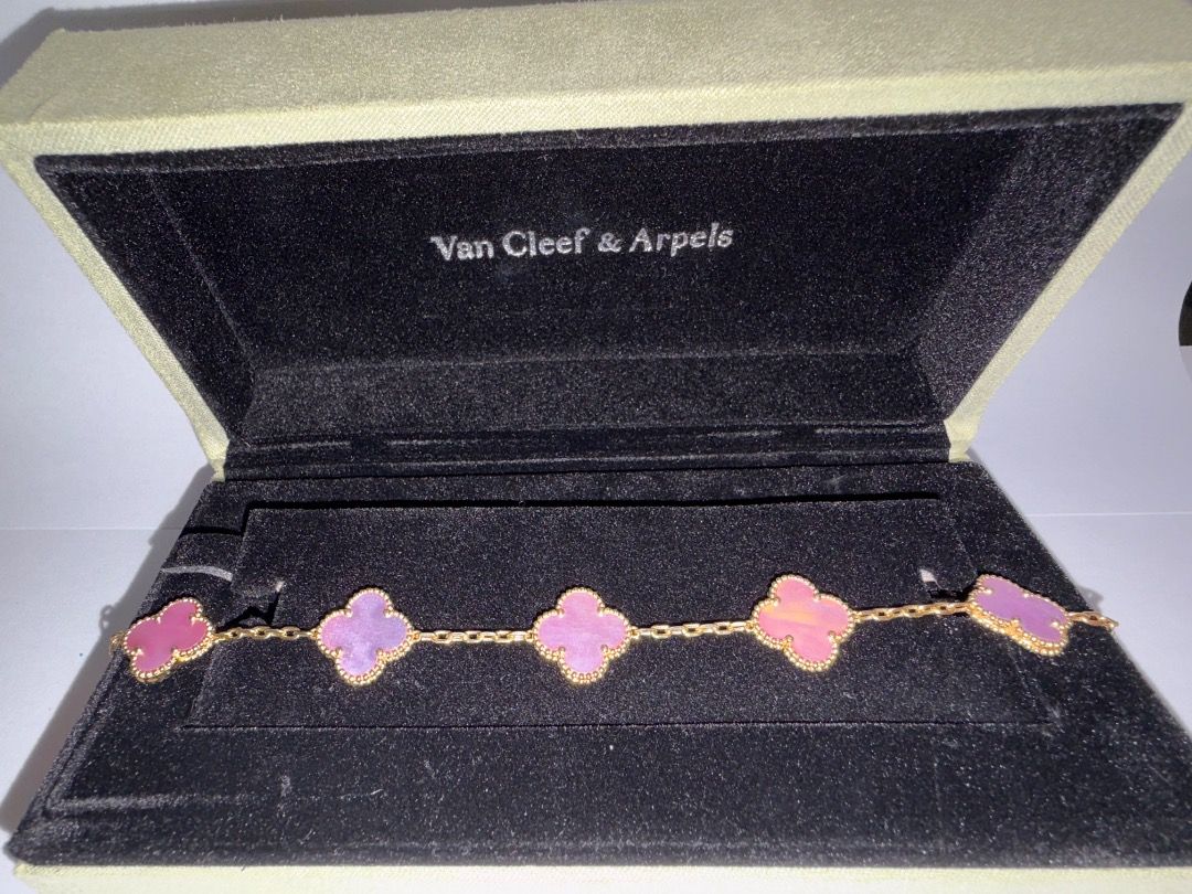 Van Cleef & Arpels Sweet Alhambra Bracelet (Category: Bracelets) located in Caloocan City. Submitted by cg031 (Listing ID 1448420359, Image 1). Description: - Authentic Van Cleef & Arpels Sweet Alhambra bracelet - Iconic four-leaf clover motif - Features mother of pearl and pink stone - Crafted in gold - Includes original box - A classic and elegant piece.